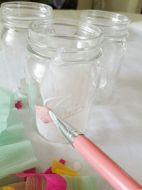 Smelling the Flowers lantern by me made out of a pickle jar. In my house we  rarely throw away glass containers because I paint them! Freehand done with  multi-surface paint. : r/upcycling